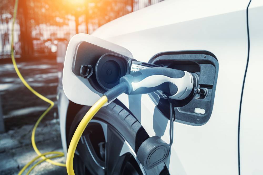 close-up-modern-electric-plug-in-hybrid-car-parked-2023-11-27-04-54-28-utc-min.jpg